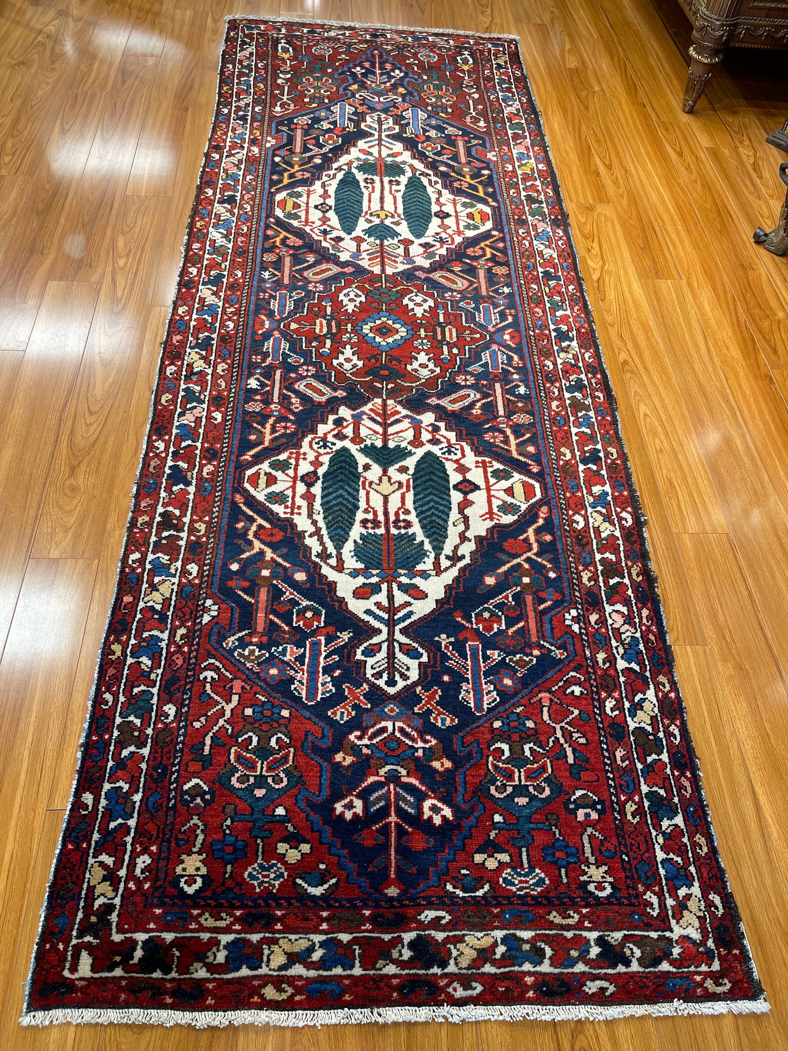 Antique Persian Bakhtiari handwoven tribal runner: Antique Persian Bakhtiari runner measuring 3 feet 6 inches wide by 10 feet 3 inches long. A Tribal Cyprus tree design wool on cotton hand knotted Persian Bakhtiari long runner. Please read the
