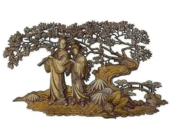 A large Asian decorative wall hanging sculpture art work: A large Asian decorative wall hanging sculpture art work. Measures 21 inches tall by 37 wide. Possibly a Japanese couple strolling into a garden with a bridge on the background. A unique reticulated
