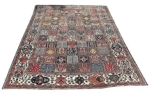 Antique Persian Bakhtiari Handwoven room size rug: Antique Persian Bakhtiari panel design Handwoven room size rug. Measuring 10 feet 2 inches wide by 13 feet 6 inches long. A large fine hand knotted Persian wool room size rug with a detailed