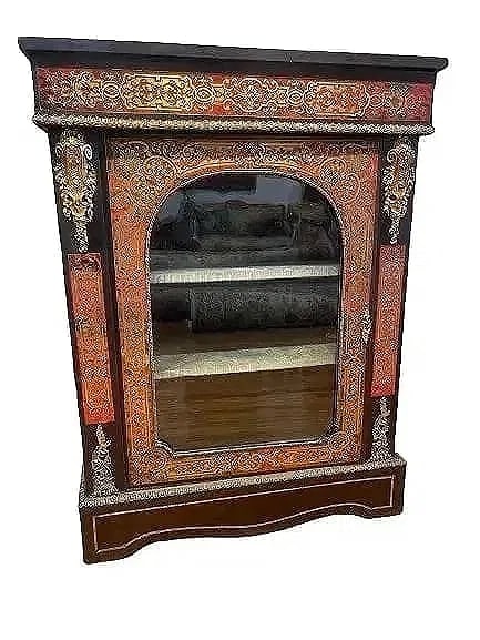 Antique French Boulle cabinet with brass inlays: Antique French Boulle cabinet with brass inlays and a glass covered door.Measuring 44 inches wide x 33 1/2 inches height X 12 inches depth. A glass door French boulle cabinet with two shelves.Please r