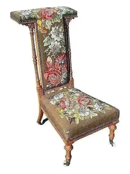 Antique French Carved PRIE DIEU Prayer Chair: Antique French Carved PRIE DIEU Prayer Chair with detailed Needlepoint upholstery. Antique stamped White Porcelain Caster Wheels on all four legs.