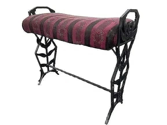 Antique Cast Iron Window Bench: Antique Cast Iron Window Bench with floral design frame. Seat height measuring 18 inches x 12 inches wide by 22 inches long. A charming and decorative antique American cast iron bench.