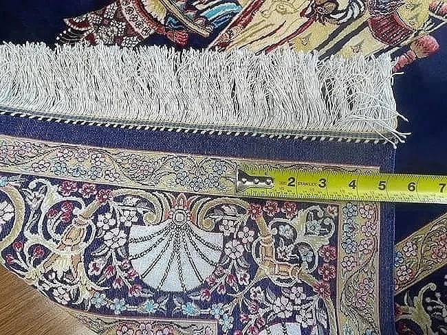 A small square silk rug - 10