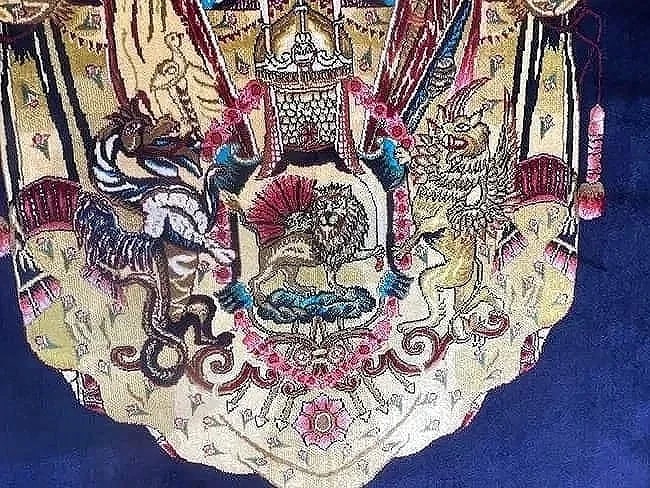 A small square silk rug - 11