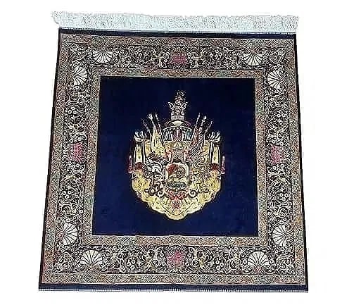 A small square silk rug: A small square silk rug with a Persian Royal crescent design . Measuring 39 inches wide by 40 inches long.