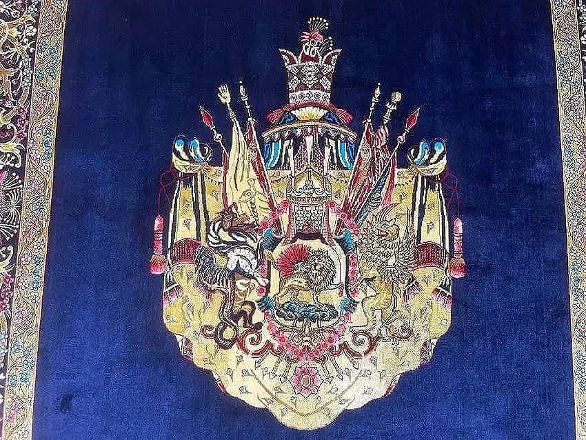 A small square silk rug - 8