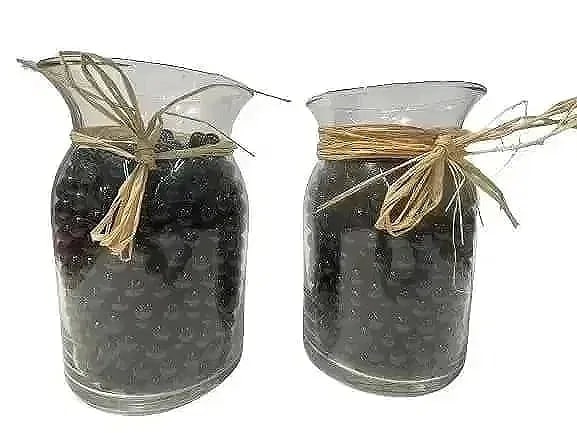 Two jars full of glass marbles: Two jars full of glass marbles. The lot includes all the dark navy blue glass marbles and the glass jars. Local pick up is highly recommended.