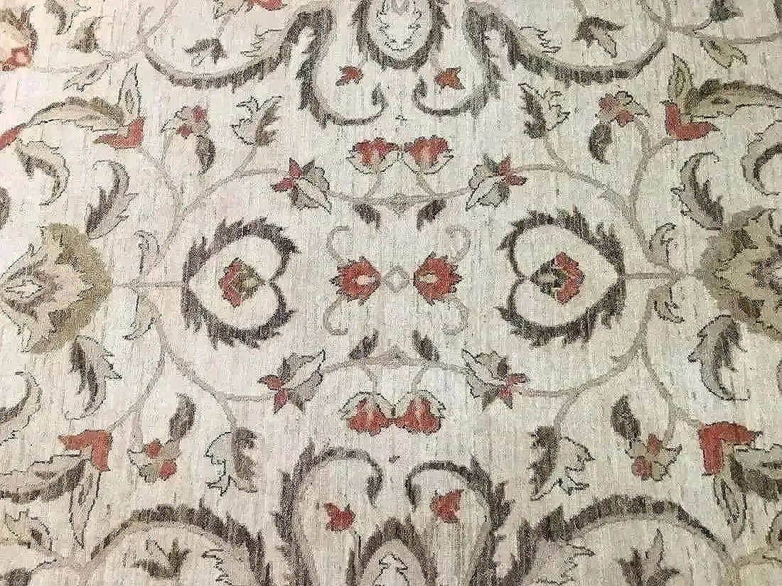 Hand woven pakistan chobi Agra room size rug: A hand woven PAKISTAN CHOBI rug Measuring 6 ft 11 inches wide by 9 ft 7 inches long.