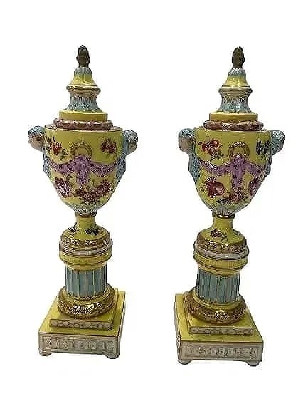 A pair of German porcelain Cassoletts with double usage covers: 19th century Antique German Porcelain Cassolettes with a double usage as urns & Candlesticks. A finely hand painted Berlin KPM type with a blue scepter mark on the bottom.