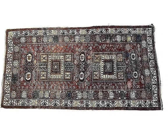 Antique Caucasian Shirvan rug: Antique Caucasian Shirvan rug. A scatter size rug measuring 4 feet 1 inches wide by 7 feet 5 inches long. A 19th century wool on wool genuine Caucasian Shirvan rug with a geometric tribal pattern.