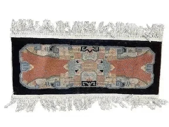 Antique Chinese Peking rug sampler: Antique Chinese Peking rug sampler measures 37 inches long by 15 inches wide including the fringes.