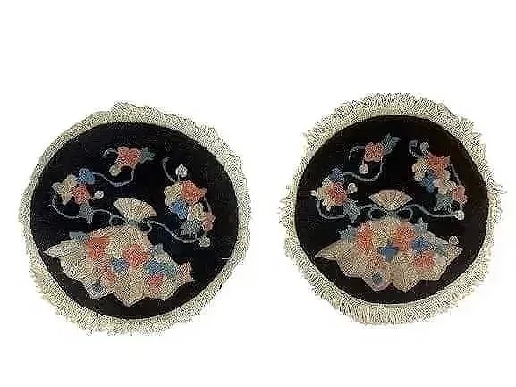 Pair of antique Chinese round rug samplers: Pair of antique Chinese round Peking rug samplers. Each round rug measures 12 inches in diameter