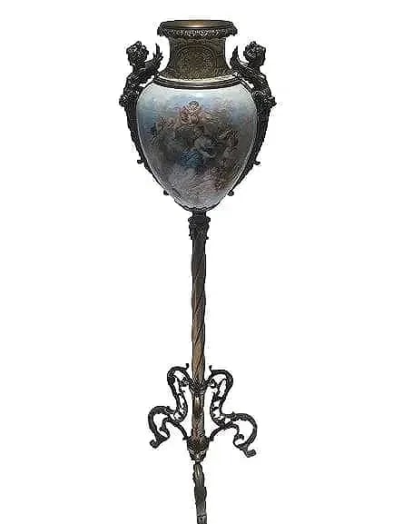 Important Signed French Sevre vase on a tripod stand: Important Signed French Sevre vase on a solid tripod stand about 5 feet tall. A highly detailed hand painted french Sevre porcelain with gilt bronze handles and resting tripod standing 58 inches tall.