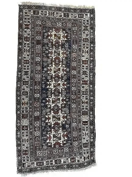 Antique Caucasian Shirvan Lesghi Star hand woven rug: Antique Caucasian Shirvan Lesghi Star hand woven rug. Antique Lesghi star Shirvan wool on wool hand woven rug with its original fringes.A row of Seven Star Leghi pattern flanked with many tribal symbo