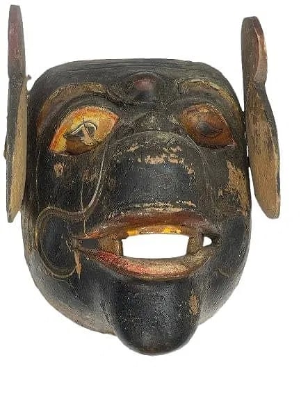 Antique Indonesian Bali wooden Mask: Antique Indonesian Bali wooden Mask measuring 7 inches by 8 inches wide. A unique deity mask hand painted wood.
