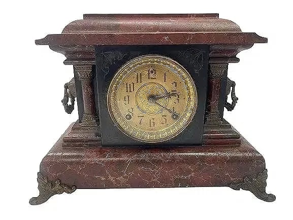 Antique Mantel Clock Seth Thomas style: Antique Mantel Clock Seth Thomas style. Antique decorative mantle clock measuring 16 inches wide by 12 inches tall and 7 inches depth. Not examined for functionality.