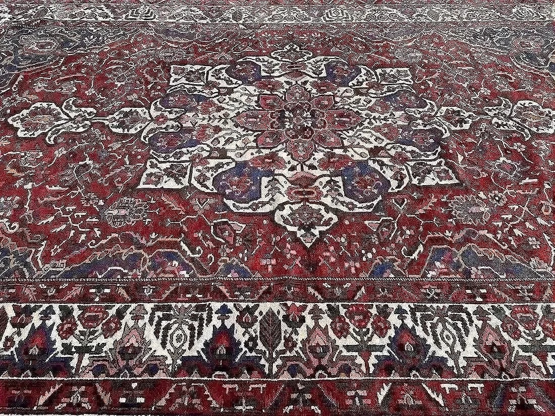 Antique Large Persian Bakhtiari hand woven Oriental rug: Antique Large Persian Bakhtiari hand woven Oriental rug measuring 10 feet 8 inches wide by 16 feet long.