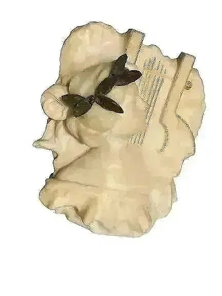 Antique Marble bust of a young lady: Antique Marble bust of a young lady measuring 17 inches by 17 inches by 8 inched thick. A European Hand carved bust with great degree of detail.