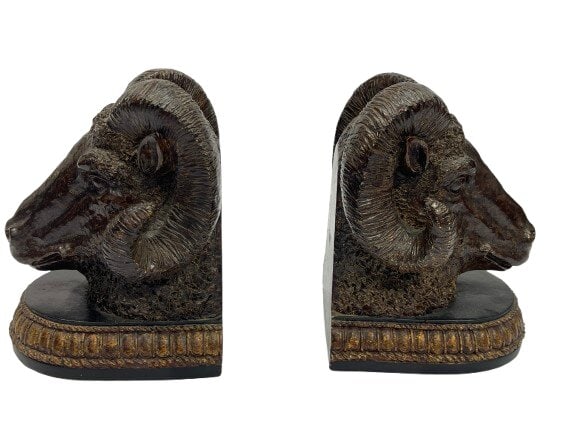 Pair of Ram's head bookends: Pair of Ram's head bookends with detailed finish.