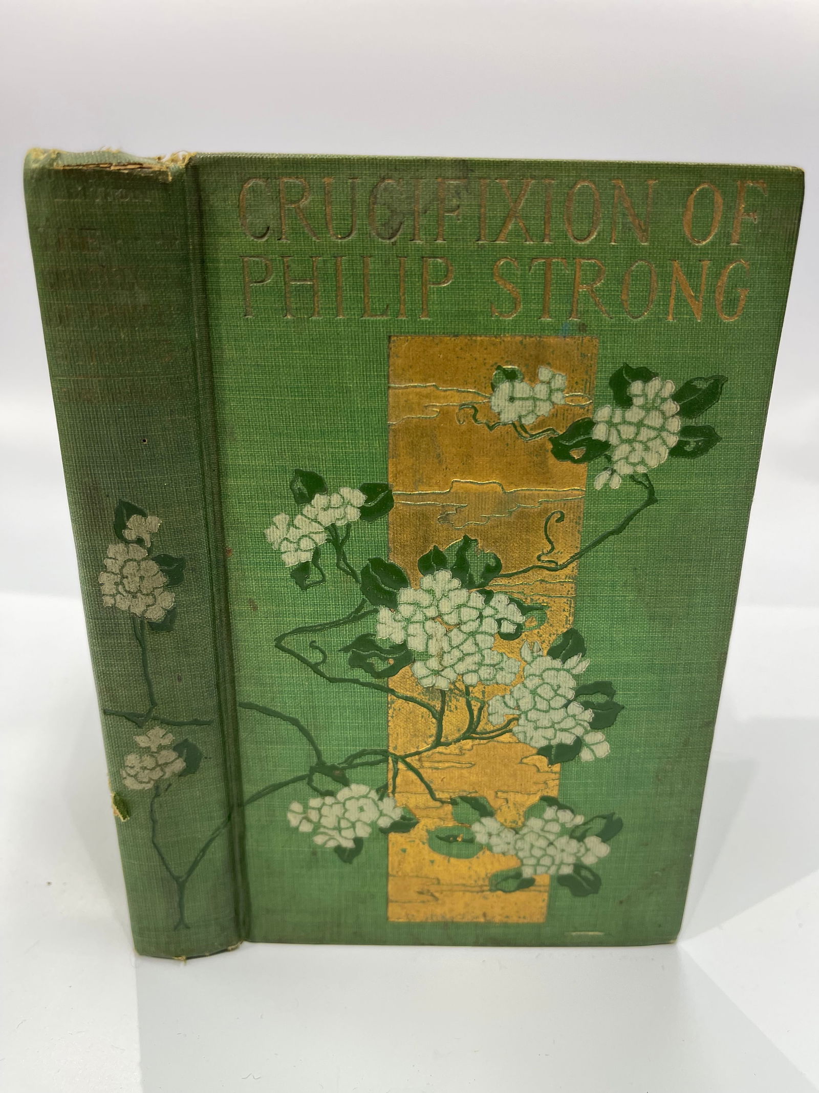 The Crucifixion of Philip Strong Ward BOOK by CHARLES M. SHELDON: A CHARLES M. SHELDON hard cover book titled:The Crucifixion of Philip Strong. Published in New york & Boston by H.M. CALDWELL COMPANY. A good condition copy. Undated, Some rubbing to edges and darkene