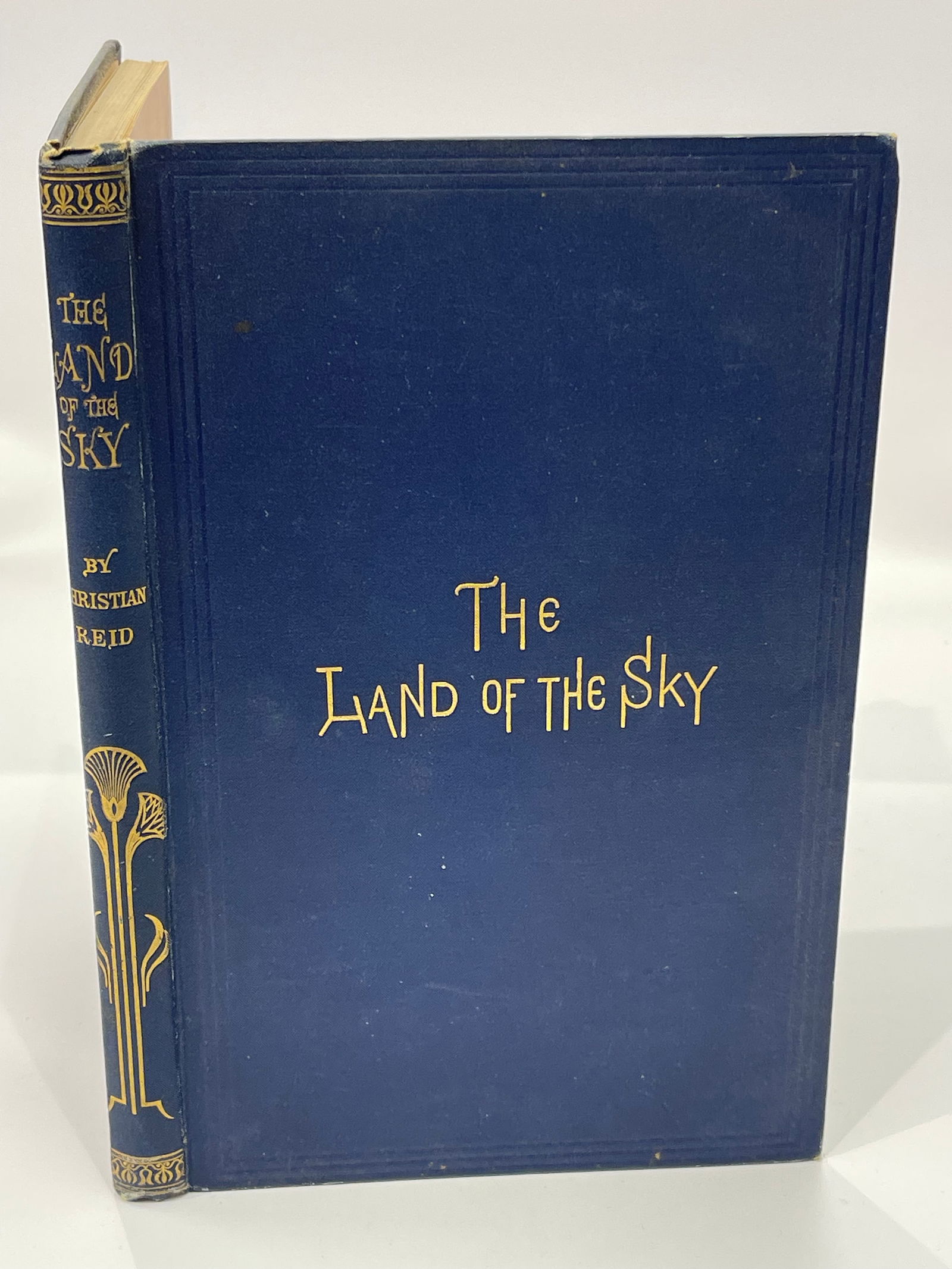 The land of the Sky book by Christian Reid: Christian Reid book titled The land of the Sky or Advantures in Mountain by-ways. A hard cover book published with illustrations in 1893 by D. Appleton and Company.