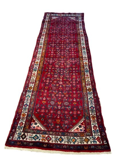 A Persian Handwoven Tribal Hamadan Wool rug: A Persian Handwoven Tribal Hamadan Wool rug measuring 3 feet 7 inches wide by 11 feet long. A full pile hand knotted Genuine Persian Hamadan rug with an all over Herati design.