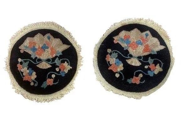 Pair of antique Chinese round rug samplers: Pair of antique Chinese round Peking rug samplers. Each round rug measures 12 inches in diameter.