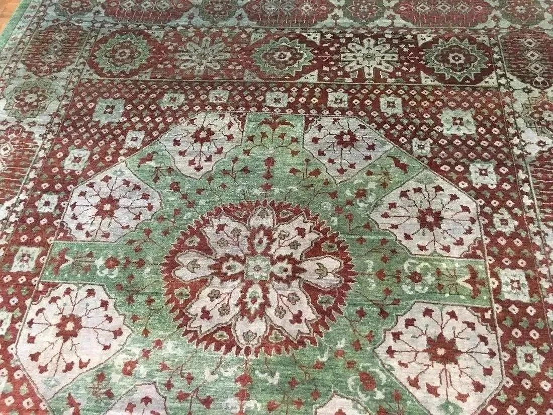 Hand woven Mamlouk Egyptian design room size rug: A hand woven Mamlouk Egyptian design wool rug Measuring 8 ft wide by 10 ft long.
