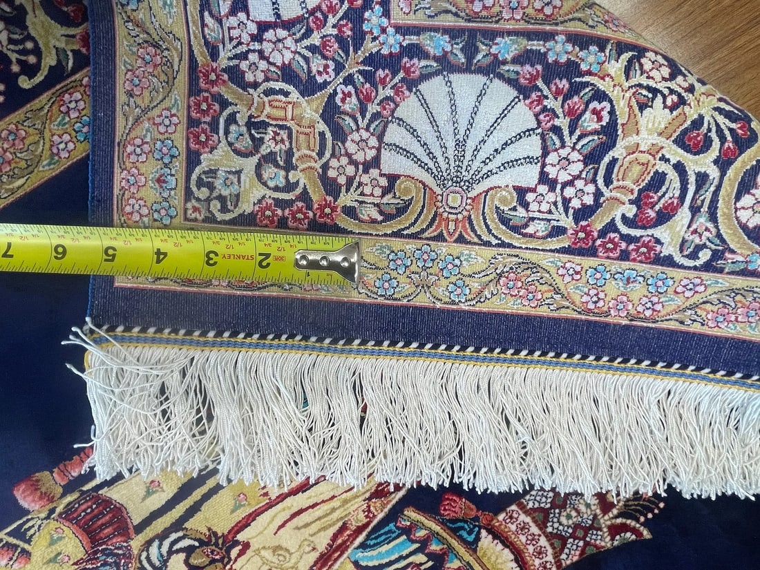 A small square silk rug - 10