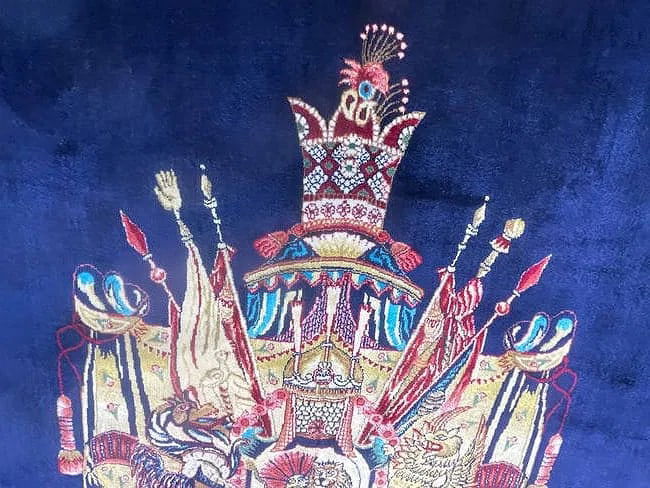 A small square silk rug - 12