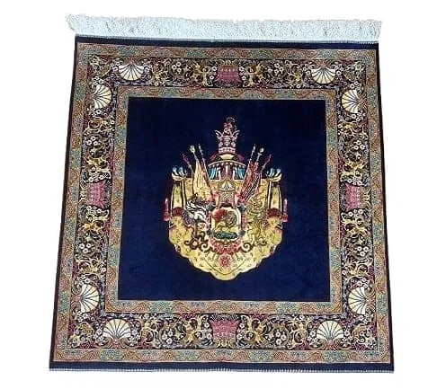 A small square silk rug: A small square silk rug with a Persian Royal crescent design . Measuring 39 inches wide by 40 inches long.