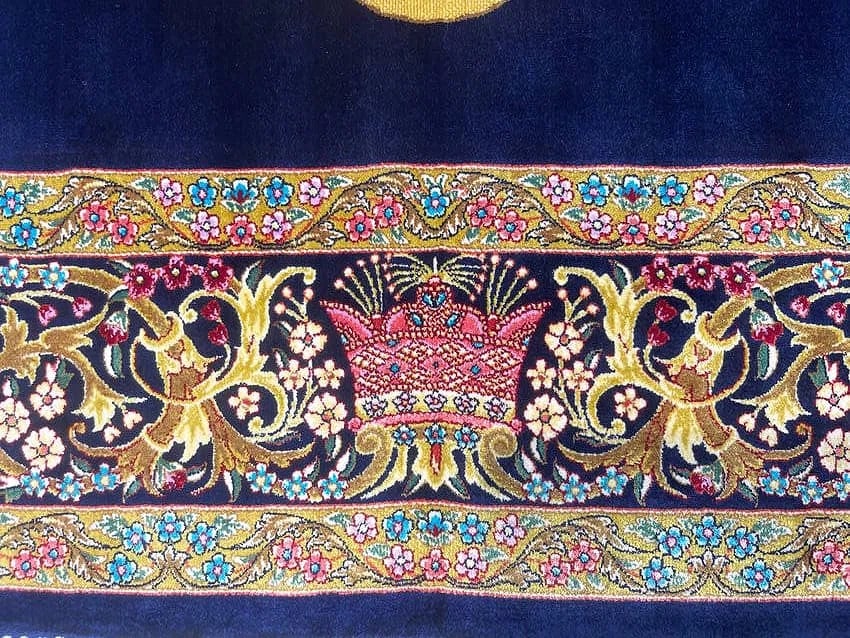 A small square silk rug - 4