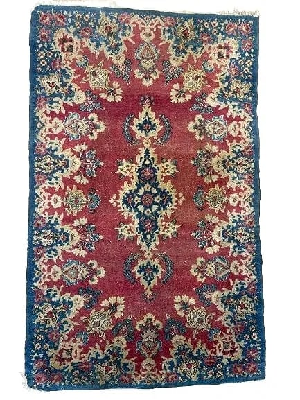 Old Persian Kerman Scatter rug: Old Persian Kerman Scatter rug measuring 3 feet wide by 5 feet long. A hand woven Floral design Persian wool kerman rug.