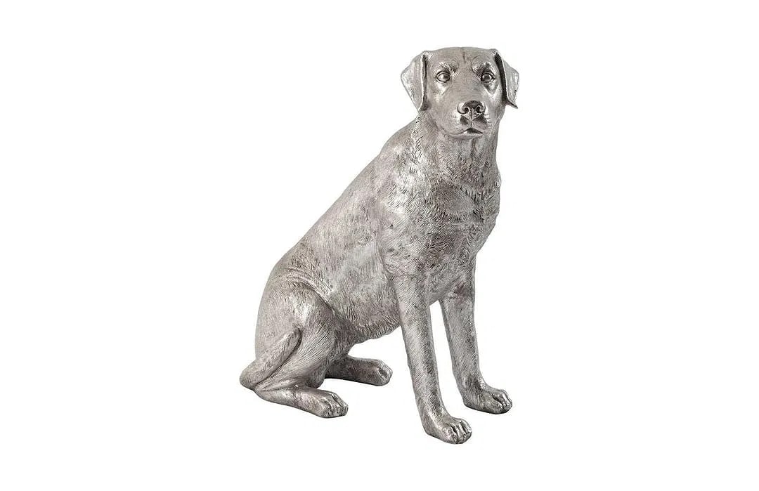 A life size Labrador silver leafed sitting dog statue: A life size Labrador silver leafed sitting dog statue measuring 32 inches tall. a large size silver color dog statue.