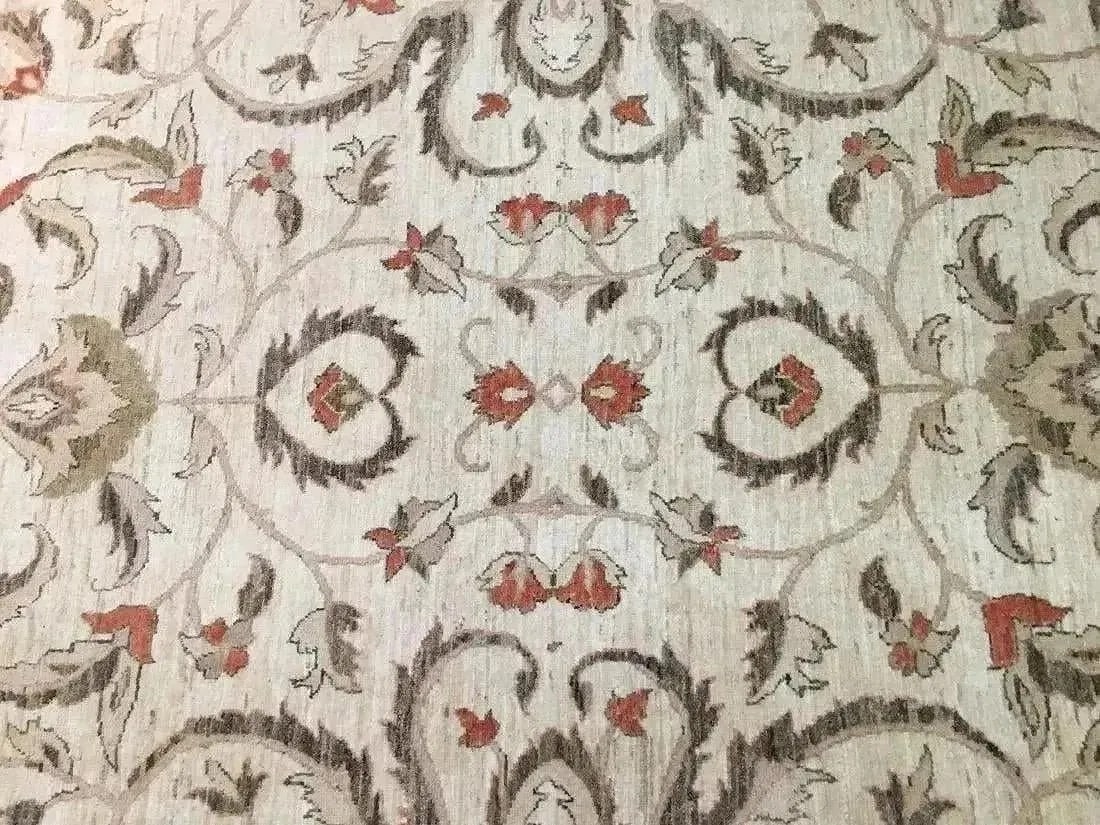 Hand woven pakistan chobi Agra room size rug: A hand woven PAKISTAN CHOBI rug Measuring 6 ft 11 inches wide by 9 ft 7 inches long.