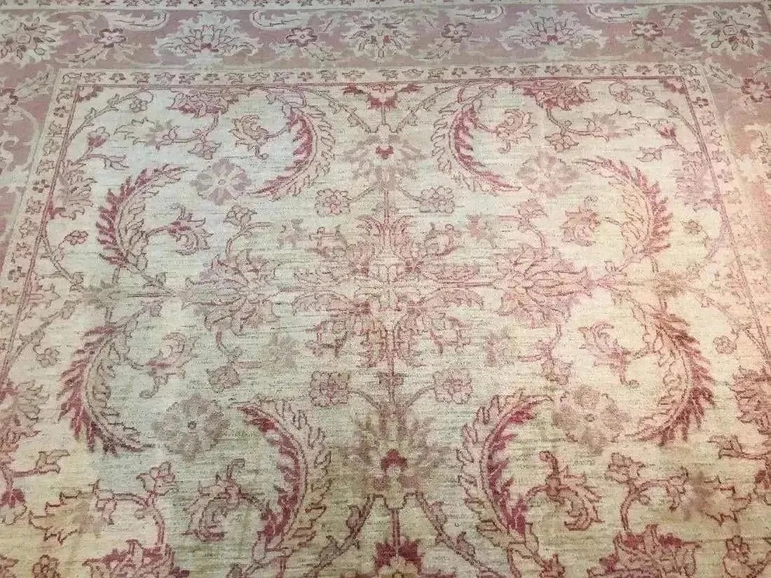Hand woven pakistan chobi Agra room size rug: A handwoven Pakistan Chobi Agra rug Measuring 6 ft 10 inches wide by 9 ft 5 inches long.