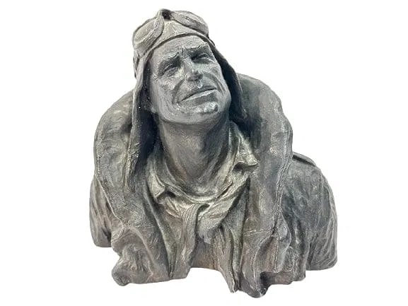 A Michael Garman Pilot AVIATOR Sculpture Bust: A Michael Garman Pilot AVIATOR Sculpture Bust. A unique decorative plaster statue of a pilot signed and dated 1973. Titled FLYING LEATHER Signed Michael Garman Plaster with Bronze tone Sculpture Bust.