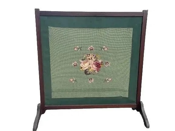 A Mahogany and Needlepoint Fireplace Screen: A Mahogany and Needlepoint Fireplace Screen. A large beautiful needlework screen measuring 32 inches wide and standing 33 1/2 inches tall.