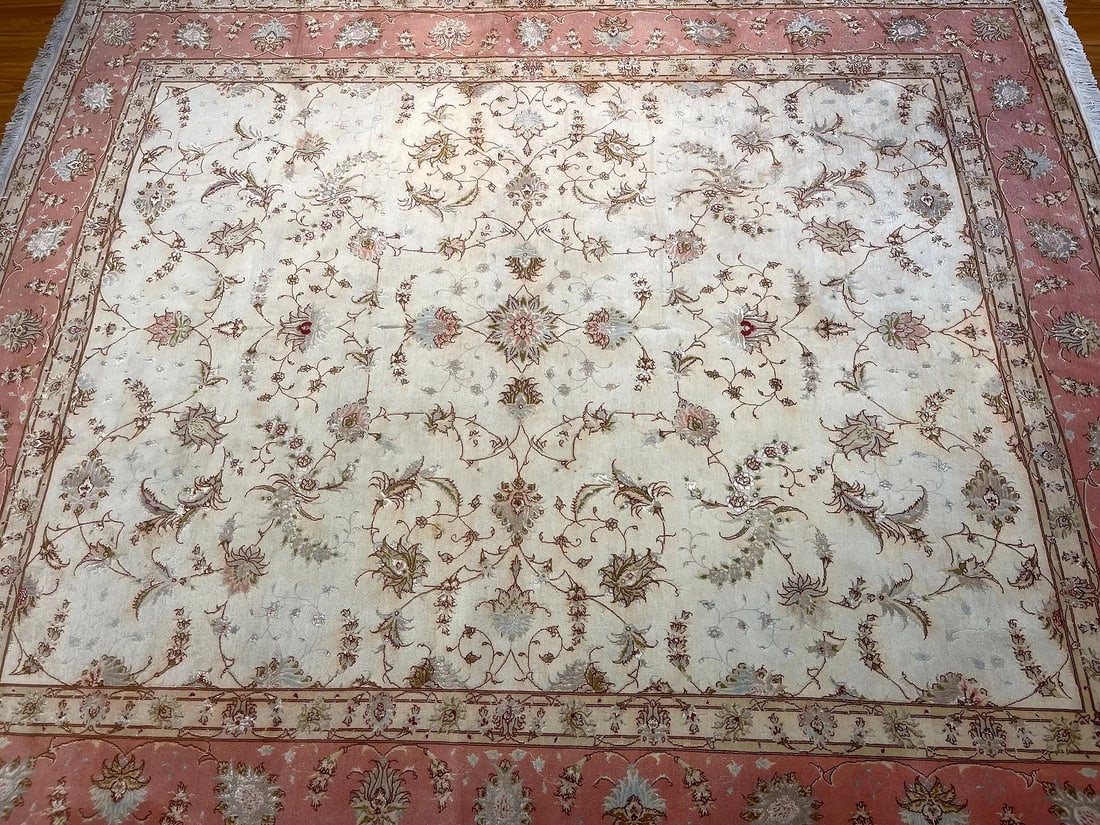 Persian Tabriz wool & silk rug: A persian Tabriz handwoven wool & silk rug measuring 8 feet 1 inch wide by 9 feet 8 inches long. A finely woven genuine Persian Tabriz used all over design rug.