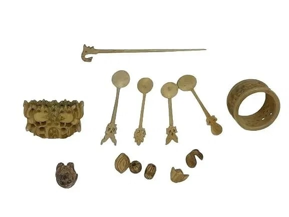 Group of Antique Asian Carved miscellaneous objects: Group of Antique Carved Asian miscellaneous objects.Some small spoons, a napkin holder & some beads. Selling AS IS.