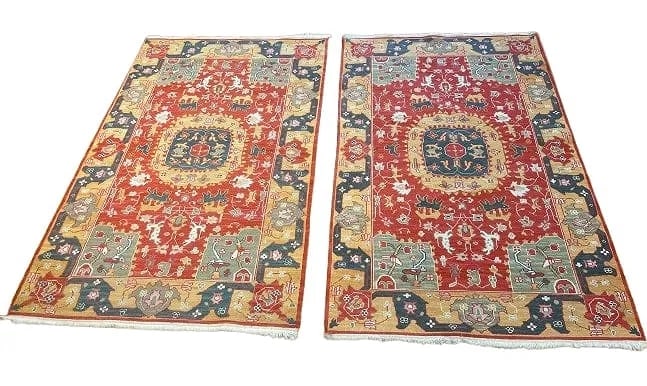 A Pair of Handwoven Asian Agra Soumak Rugs: A Pair of Handwoven Agra Soumak Rugs measuring 3 feet 10 inches wide by 6 feet long. A pair of unique flat woven rugs with an Indian Agra design.