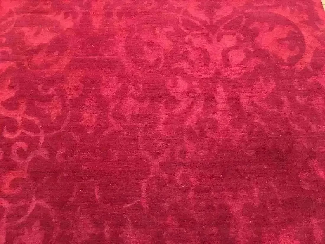 A Nepalese contemporary handwoven rug: A Nepalese contemporary handwoven wool rug measuring 3 feet wide by 4 feet 10 inches.