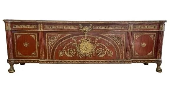 A massive French Louis XVI style credenza sideboard cabinet 9 feet wide: A massive French Louis XVI style gilt brass mounted mahogany credenza sideboard cabinet commode a Vantaux after the model by Joseph Stockel and Guillaume Benneman. Height: 36 1/2 inches X Width: 9