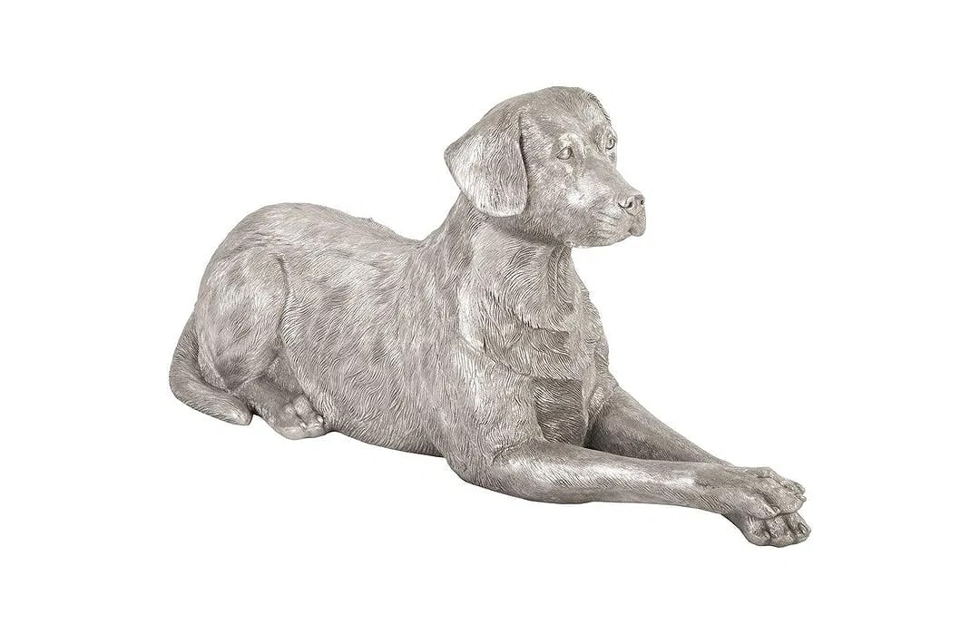 A life size Labrador silver leafed sitting dog statue: A life size Labrador silver leafed sitting dog statue measuring 46 inches seated long and 28 inches tall. A large size silver color dog statue.