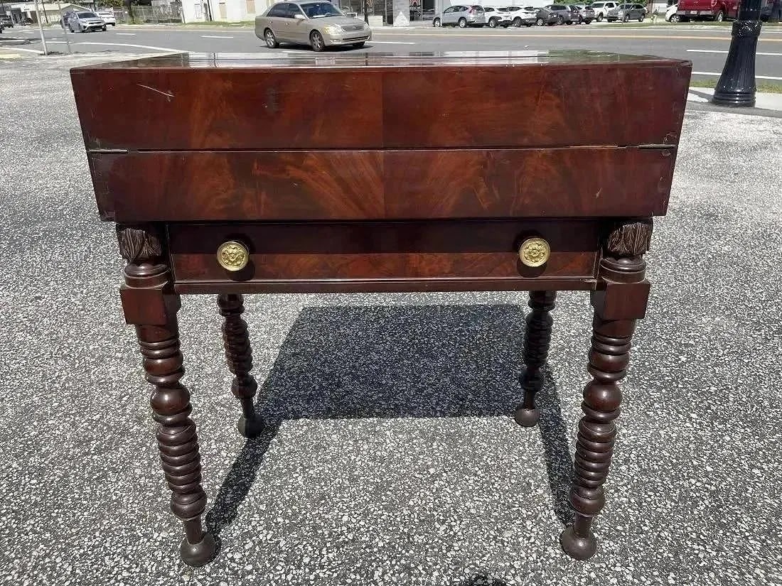 Antique Rare Empire Mahogany Folding writing desk: Important Antique Mahogany Empire Folding rare Secretary writing desk.Early 18th century Turned legs with ball feet. Flip down hidden drawers unfolding desk opening to three drawers with the original