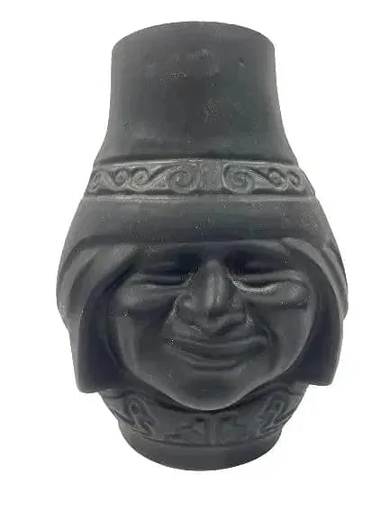 A Navajo style pottery Vase: A Navajo style pottery Vase standing 9 inches tall. A double sided smiling Navajo figure. A unique & highly decorative vase.
