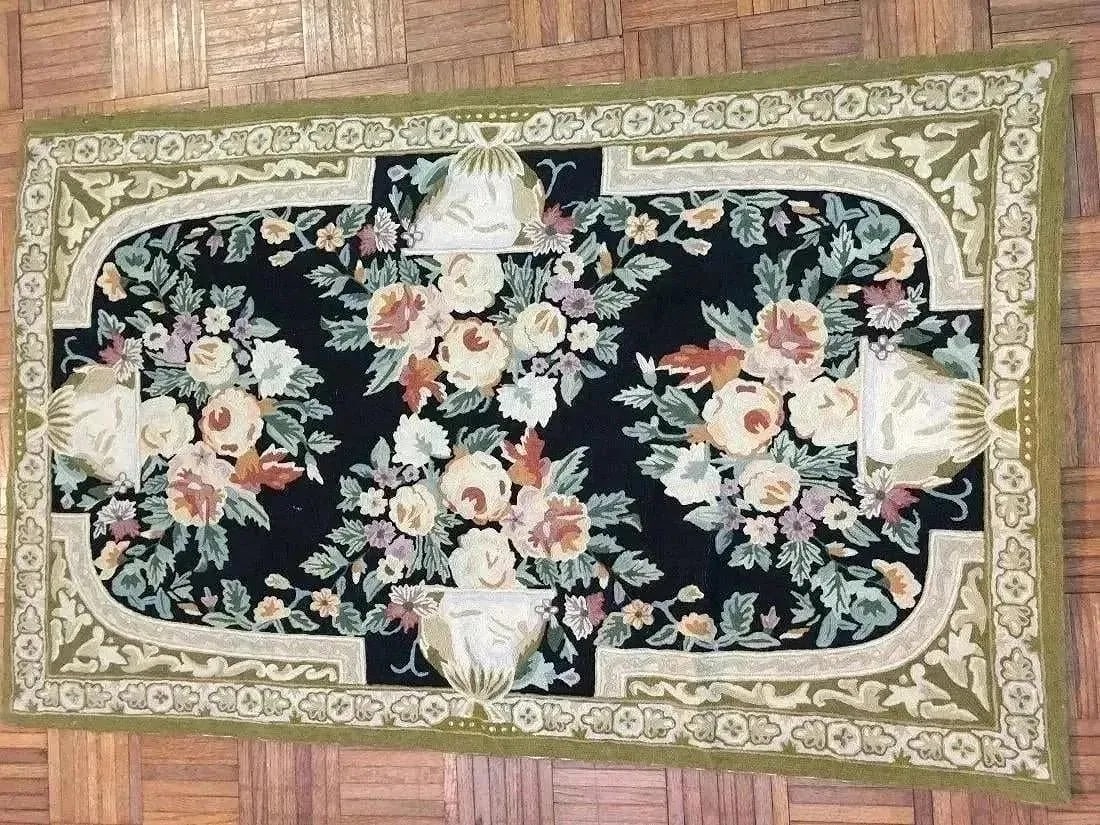 An old Chainstich rectangular tapestry rug: An old Chainstich rectangular tapestry rug measuring 3 feet wide by 5 feet long. Hand made in India. We offer in house shipping of this lot to any USA destination for a flat fee of $ 55 dollars.