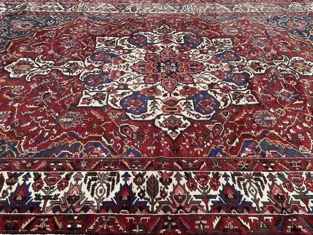 Antique Large Persian Bakhtiari hand woven Oriental rug: Antique Large Persian Bakhtiari hand woven Oriental rug measuring 10 feet 8 inches wide by 16 feet long.