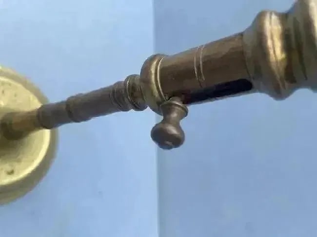 A Brass Candlestick with ejector - 3