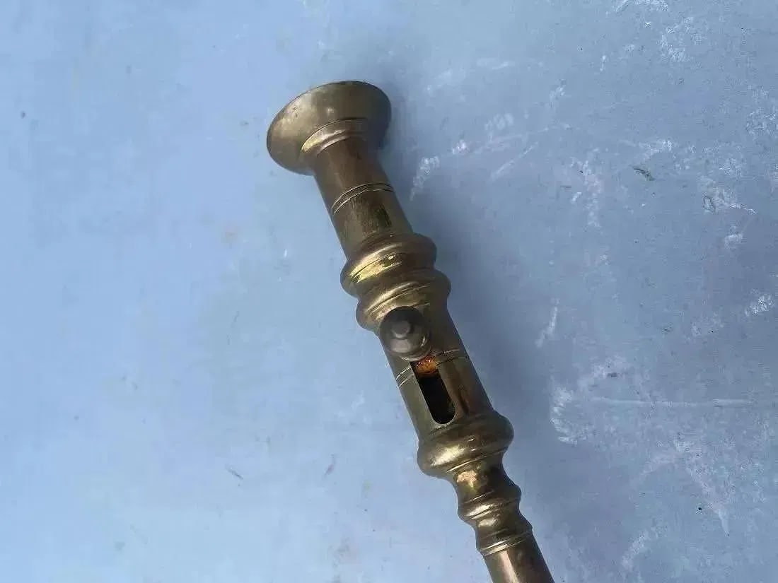 A Brass Candlestick with ejector - 6